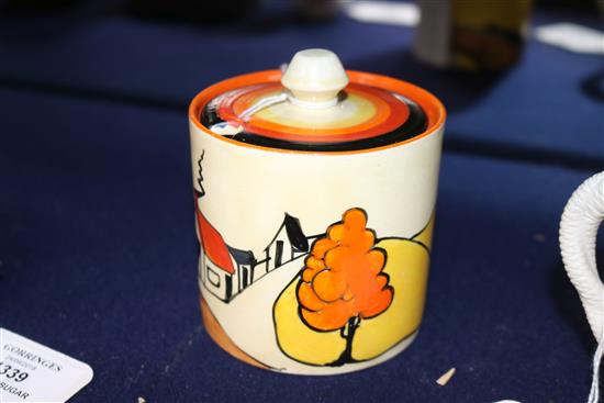 A Clarice Cliff House and Bridge preserve pot and cover height 9.5cm